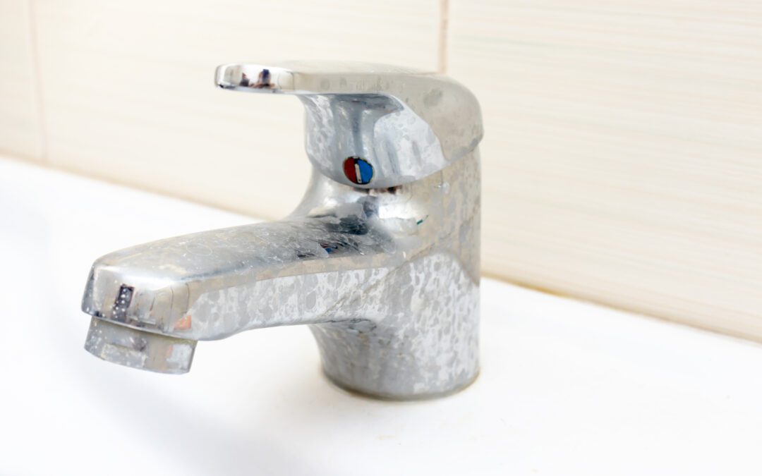 Dirty faucet with limescale, calcified water tap with lime scale Robertson Family Water